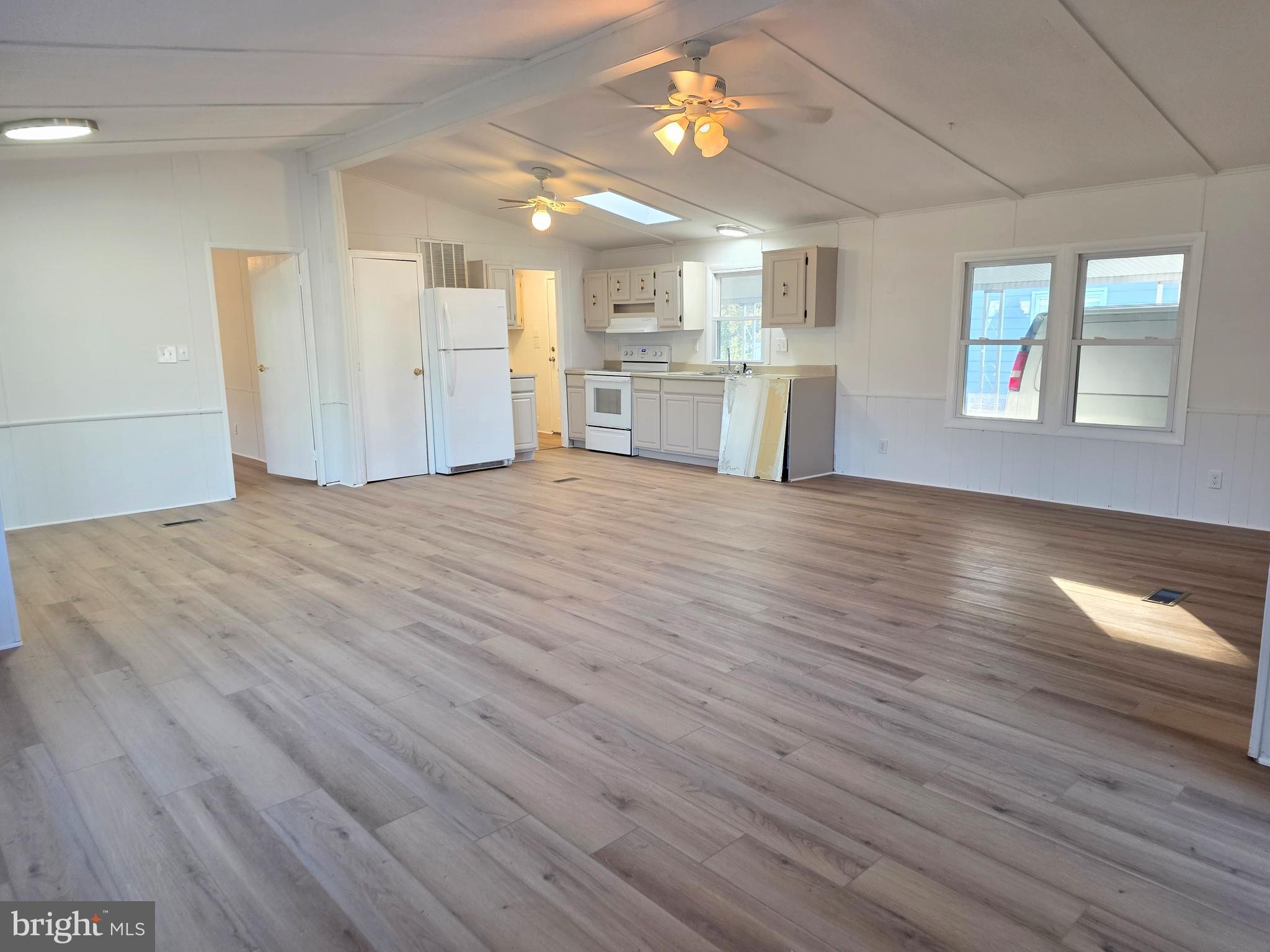 7 Barbara Lane Barnegat, NJ 08005 - Photo 6 of 25 a view of a kitchen with wooden floor and a window