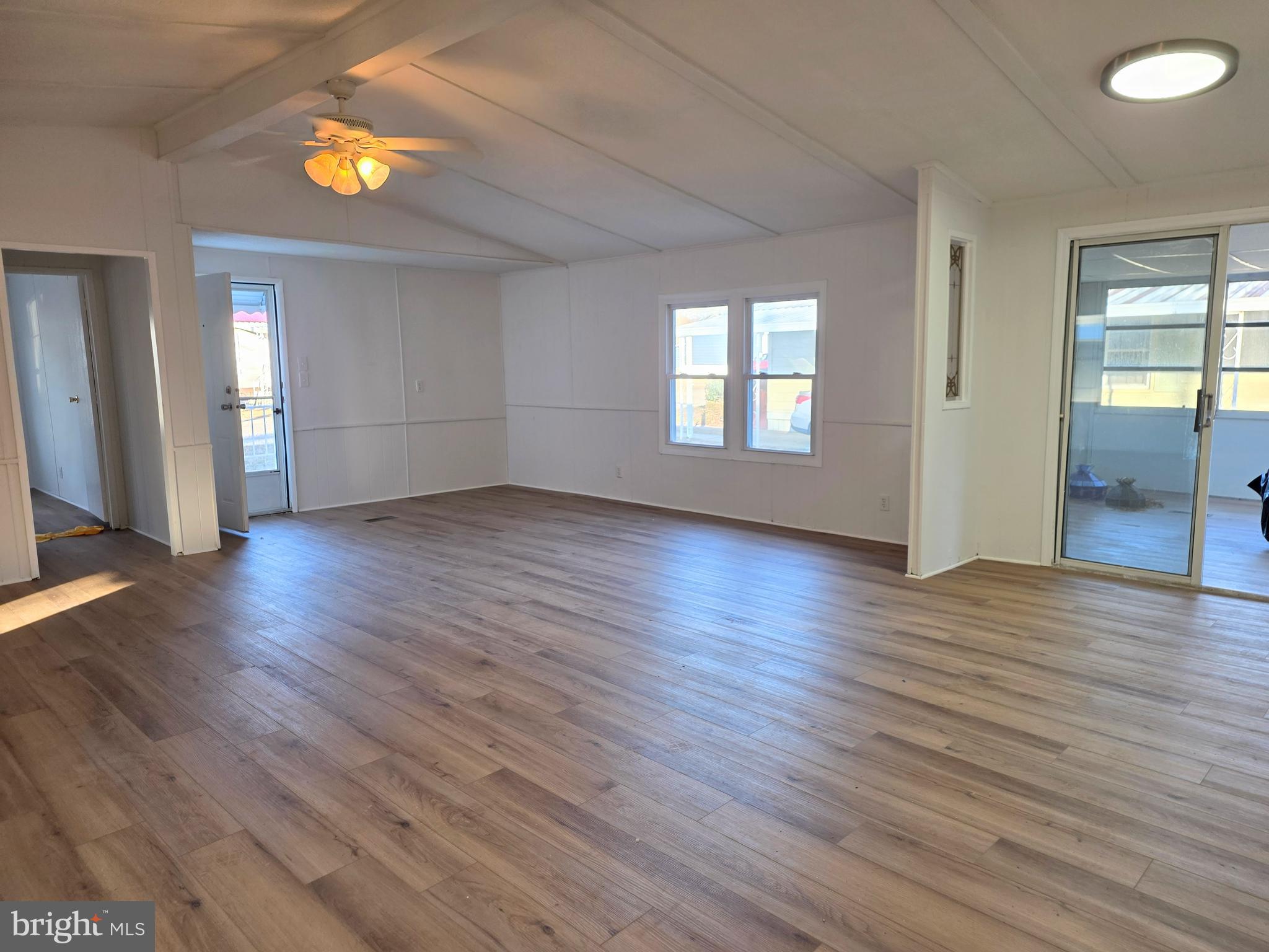 7 Barbara Lane Barnegat, NJ 08005 - Photo 7 of 25 an empty room with wooden floor and windows
