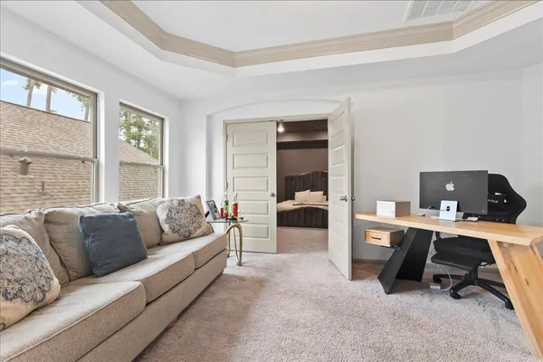 a living room with furniture and a window