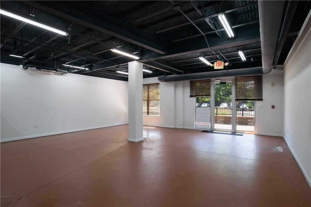 5300 Peachtree Road, Unit 1306 Chamblee, GA 30341 - Photo 6 of 7 a view of water heater room with wooden floor