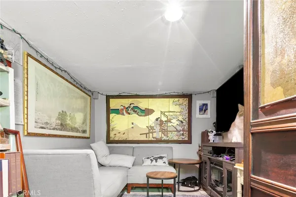 a room with furniture and a window