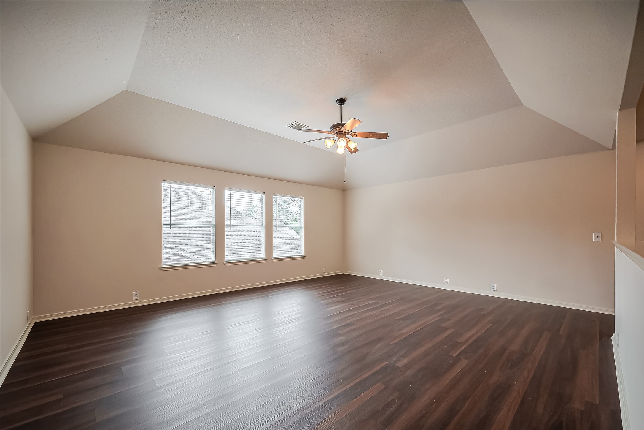 20006 Shavon Springs Drive Spring, TX 77388 - Photo 18 of 50 a view of an empty room with wooden floor and a window