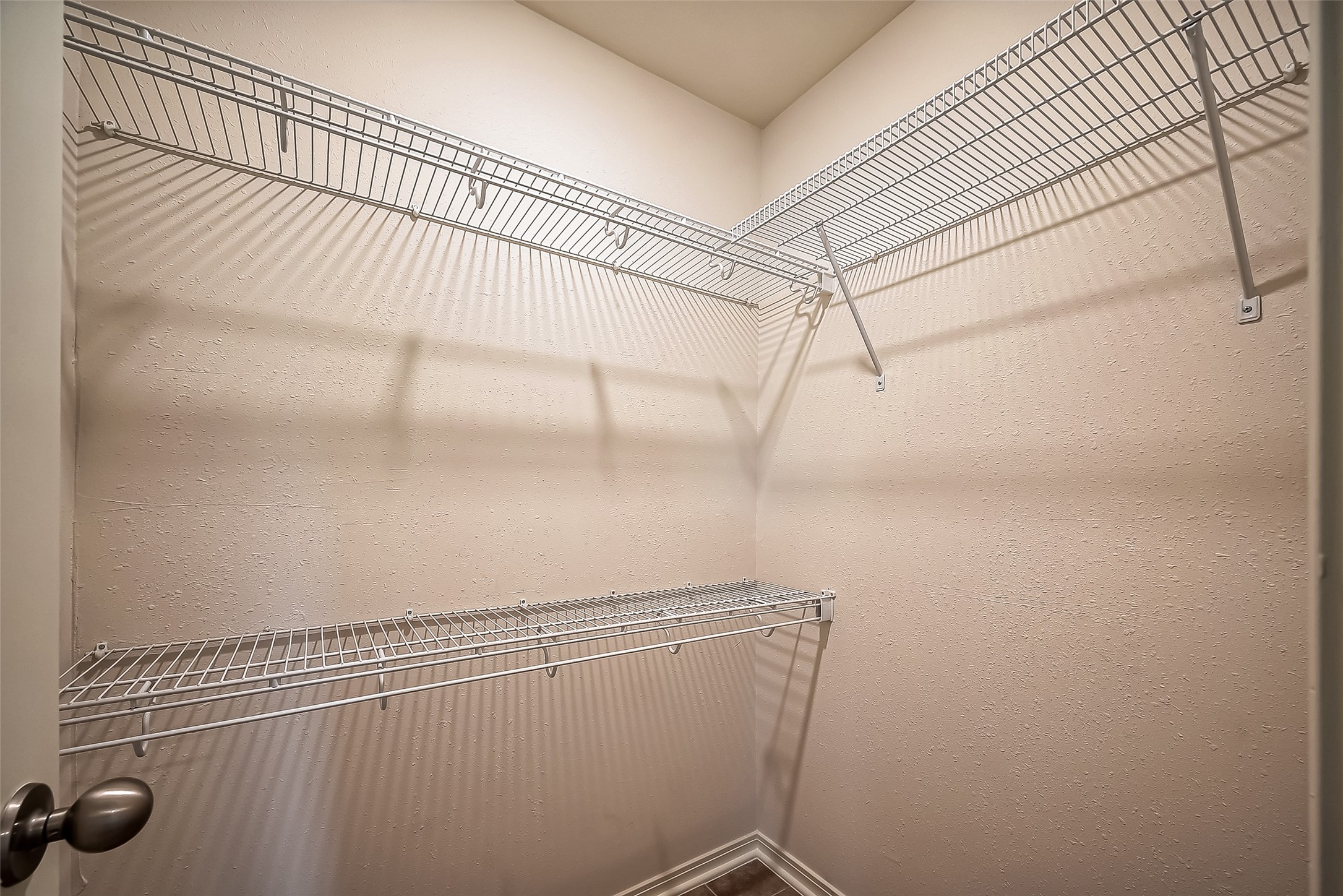 20006 Shavon Springs Drive Spring, TX 77388 - Photo 25 of 50 a view of a room with racks on the wall