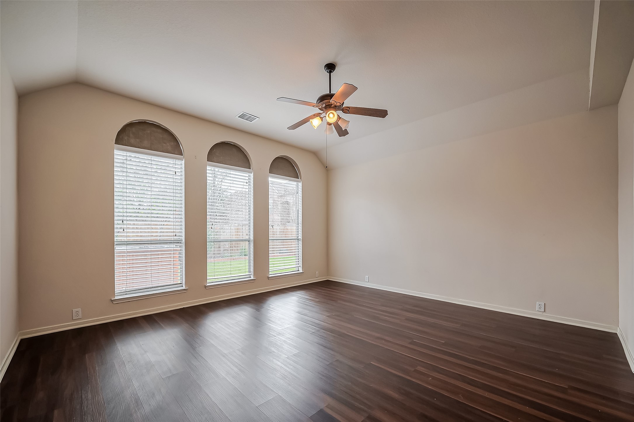 20006 Shavon Springs Drive Spring, TX 77388 - Photo 39 of 50 a view of an empty room with wooden floor and a window