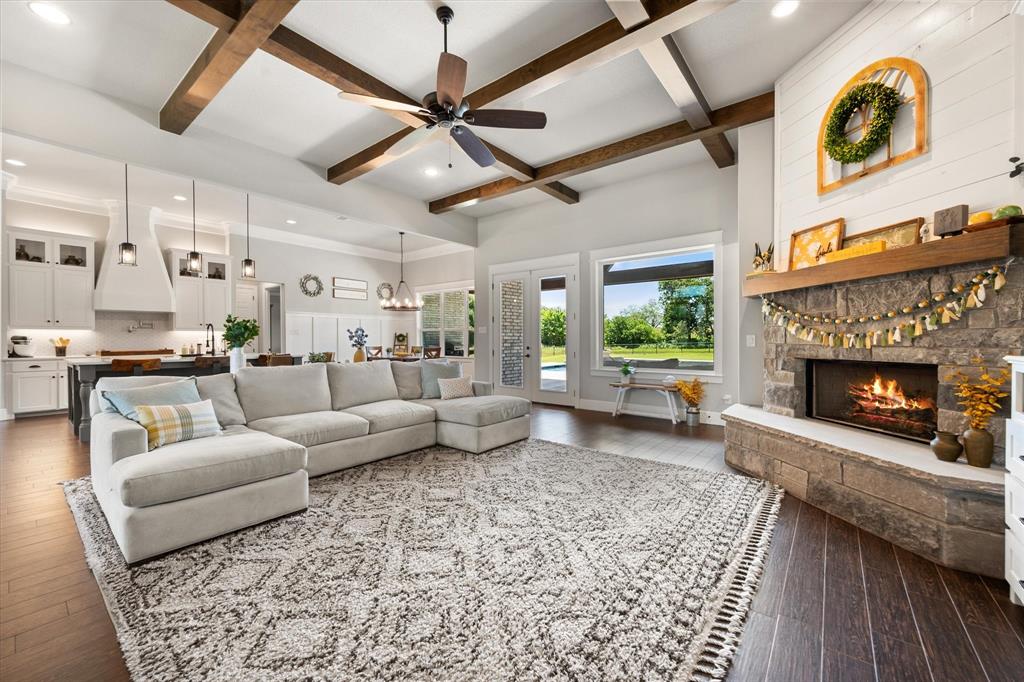 6425 Starlight Ranch Road Godley, TX 76044 - Photo 6 of 37 Kitchen and dining is open to the great room. Abundance of natural light flows in from the cased windows. Great views of the patio and pool area.