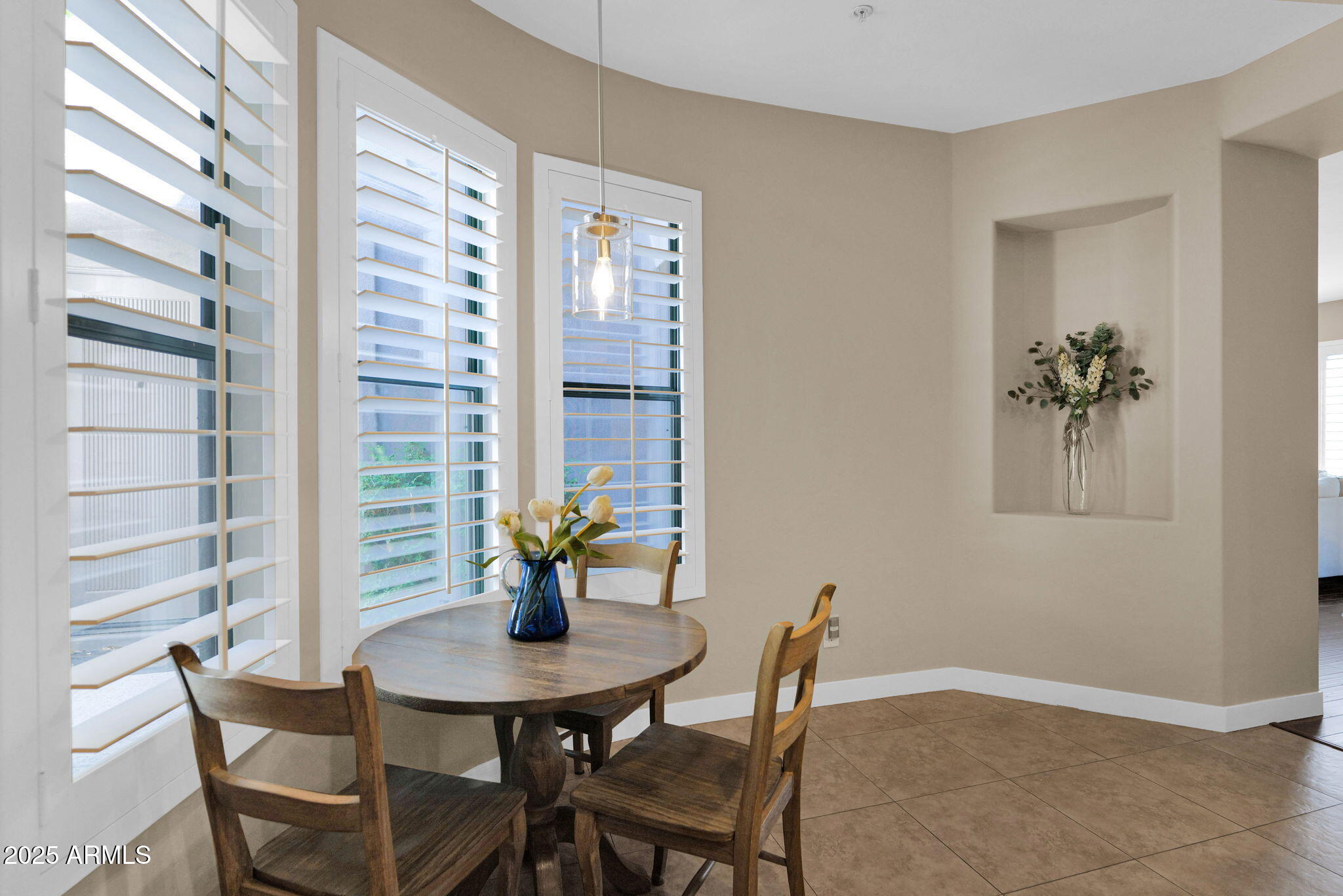 19550 North Grayhawk Drive, Unit 1063 Scottsdale, AZ 85255 - Photo 12 of 40 a view of a room with furniture and wooden floor