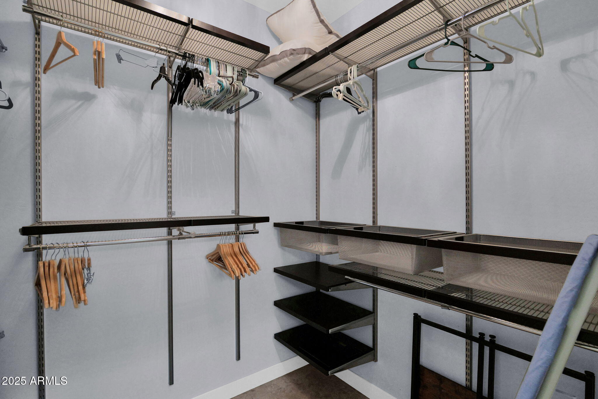 19550 North Grayhawk Drive, Unit 1063 Scottsdale, AZ 85255 - Photo 17 of 40 a view of a walk in closet