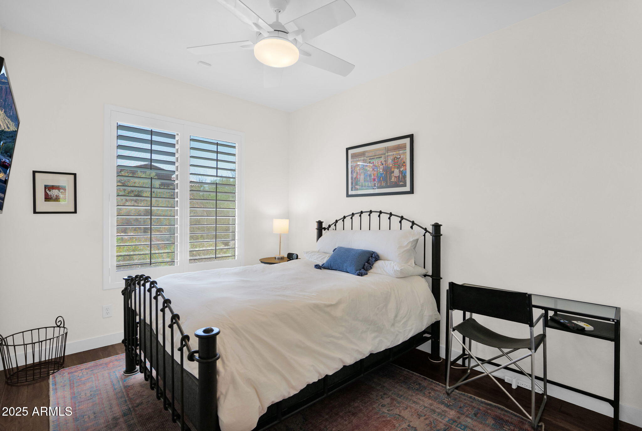 19550 North Grayhawk Drive, Unit 1063 Scottsdale, AZ 85255 - Photo 28 of 40 a bedroom with a bed and a window