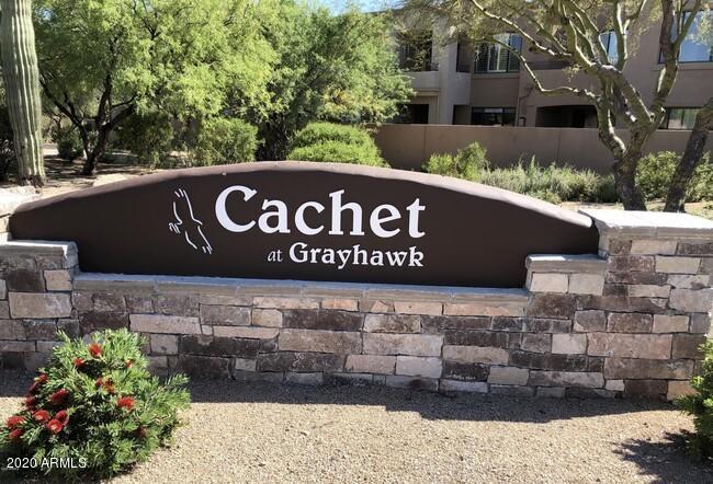 19550 North Grayhawk Drive, Unit 1063 Scottsdale, AZ 85255 - Photo 39 of 40 a view of outdoor space with signage and flags