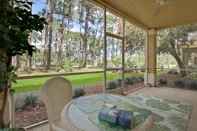 a swimming pool with outdoor space and seating