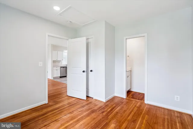 a bathroom with a sink vanity and a mirror