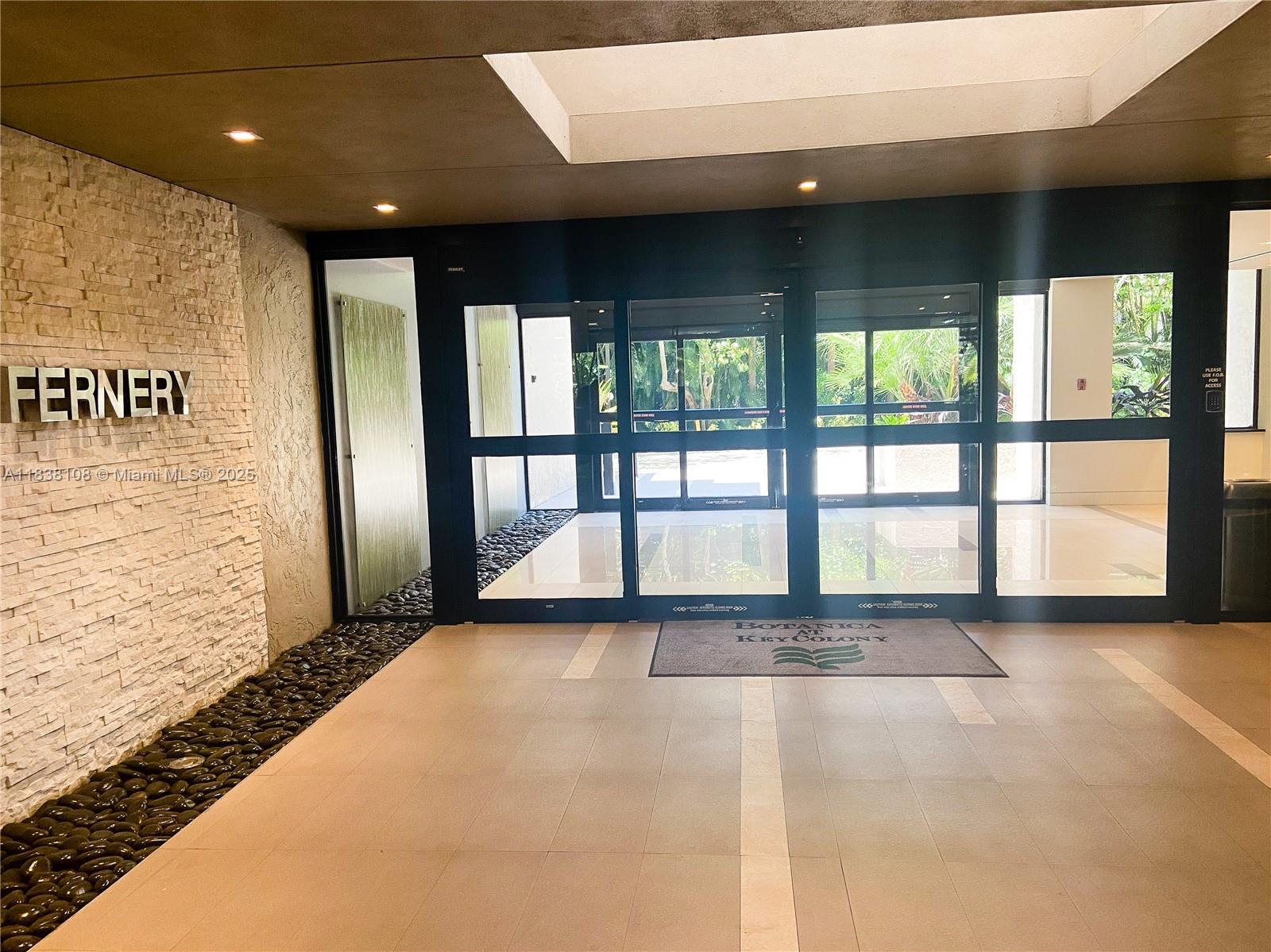 141 Crandon Boulevard, Unit 342 Key Biscayne, FL 33149 - Photo 20 of 25 a view of an empty room with a window