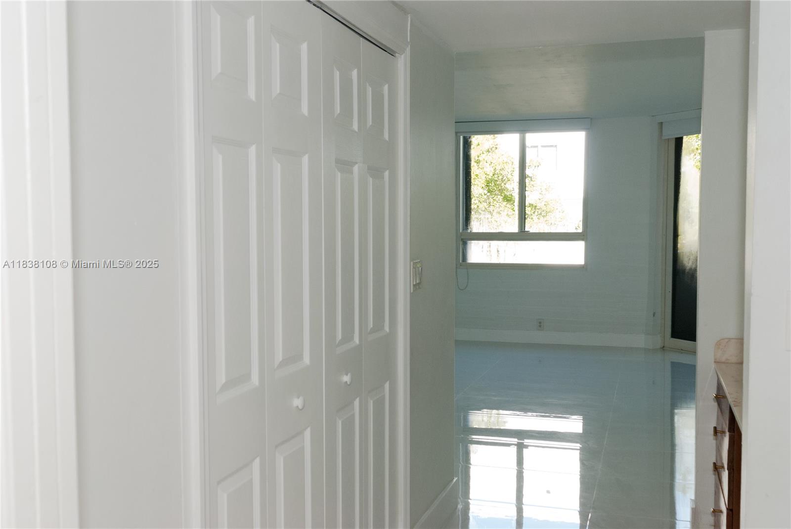 141 Crandon Boulevard, Unit 342 Key Biscayne, FL 33149 - Photo 5 of 25 a view of an entryway with a window