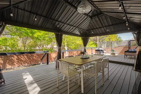 a view of outdoor sitting area with furniture