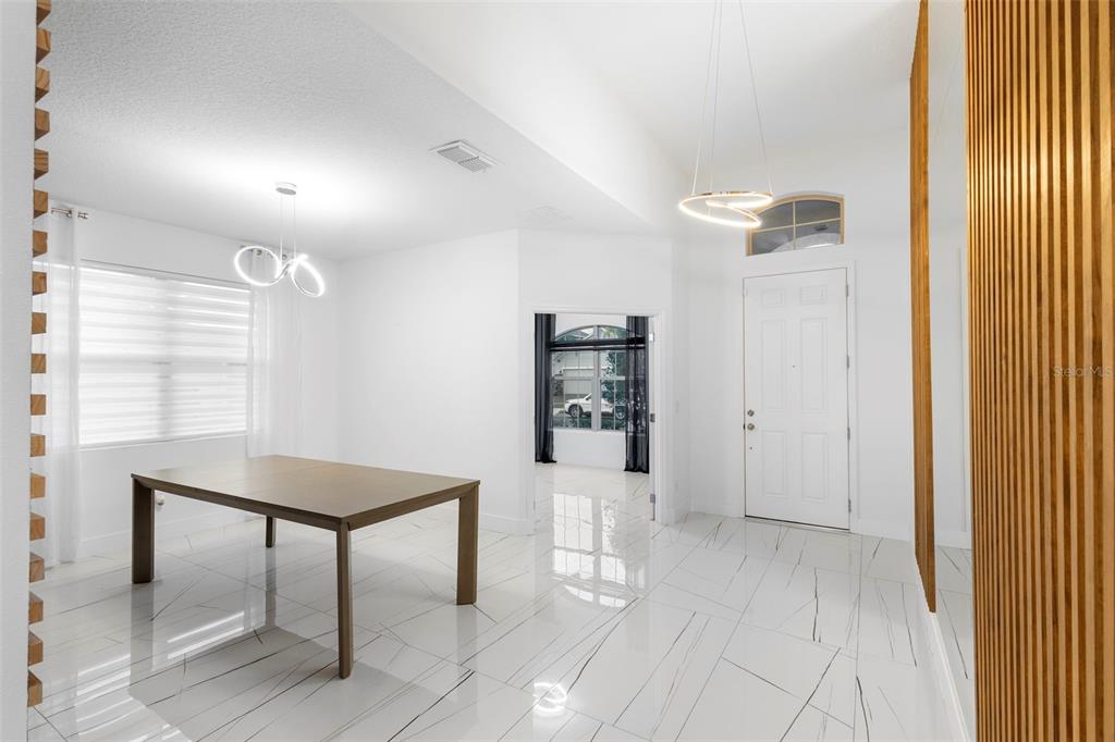 2342 Kaley Ridge Road Clermont, FL 34715 - Photo 13 of 54 a view of a room with furniture and windows