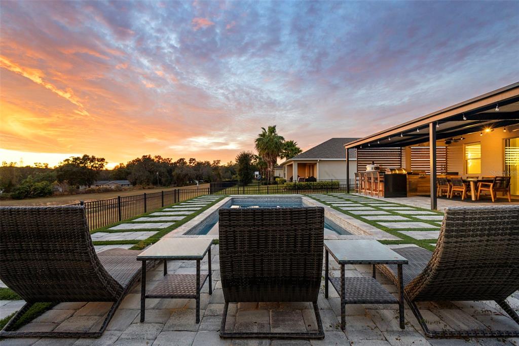 2342 Kaley Ridge Road Clermont, FL 34715 - Photo 23 of 54 a terrace of a house with outdoor seating