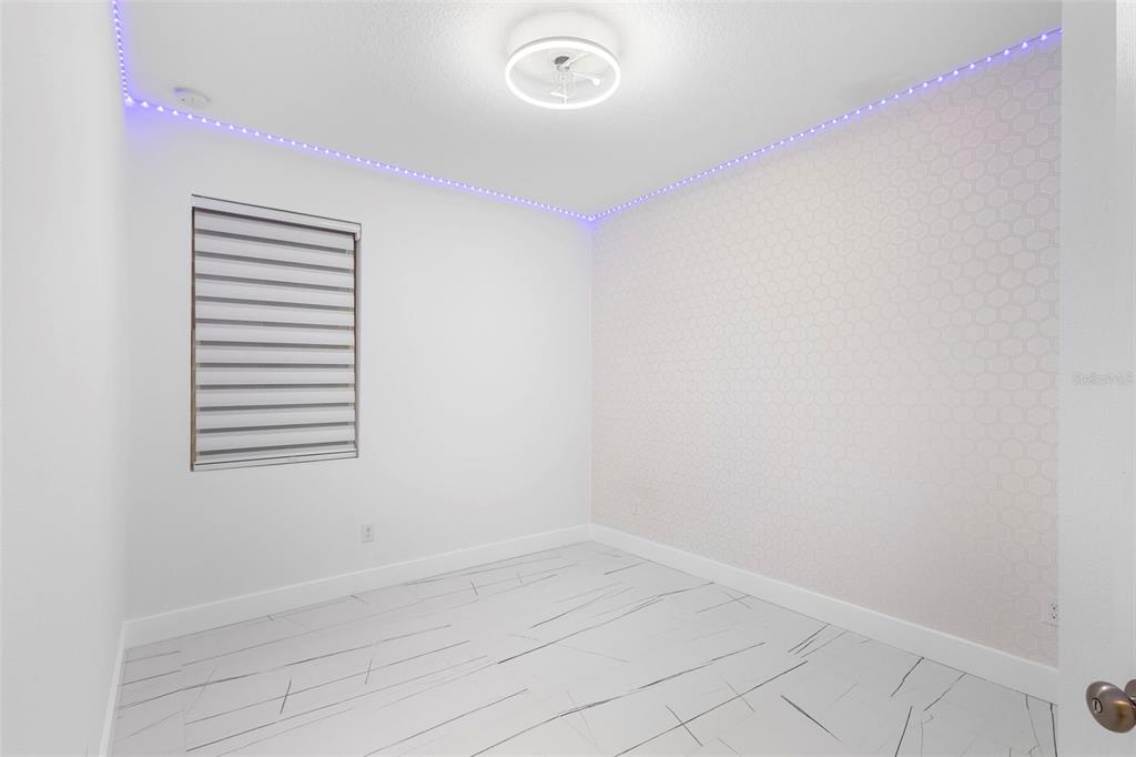 2342 Kaley Ridge Road Clermont, FL 34715 - Photo 31 of 54 a view of a room that has a window in it