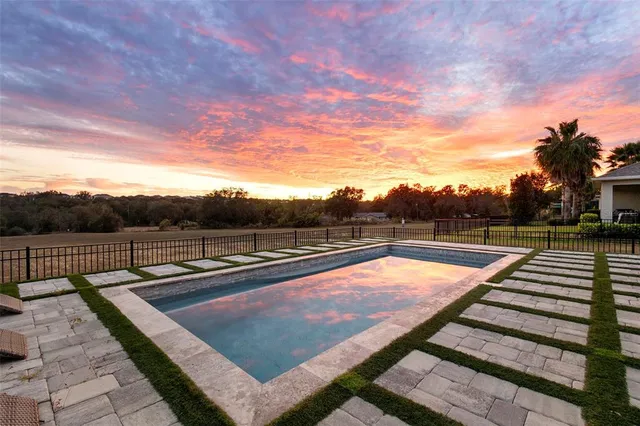 a view of a storage and utility room with washer and dryer