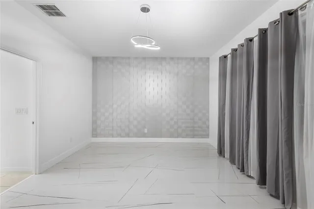 a view of kitchen with furniture and fire place