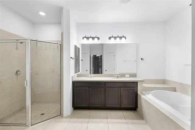 a kitchen with stainless steel appliances a sink and cabinets