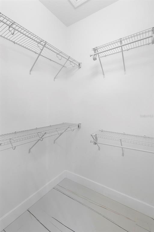 2342 Kaley Ridge Road Clermont, FL 34715 - Photo 40 of 54 a view of a room with racks on the wall