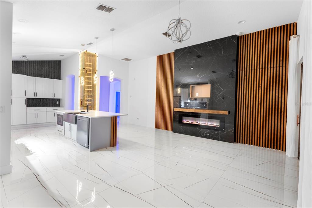 2342 Kaley Ridge Road Clermont, FL 34715 - Photo 41 of 54 a view of kitchen with furniture and fire place