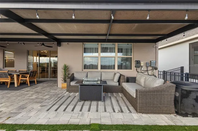 a view of a kitchen with a large window