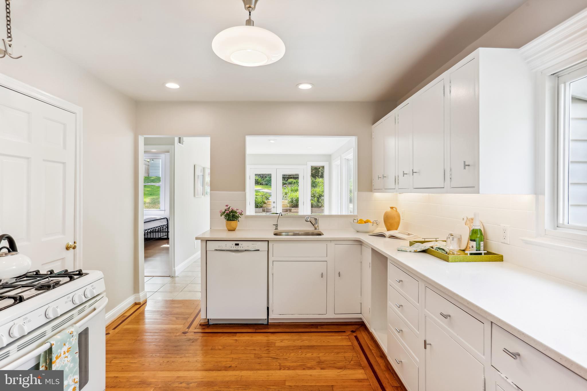 306 Dennis Avenue Silver Spring, MD 20901 - Photo 17 of 61 Overlooks dining and gardens beyond