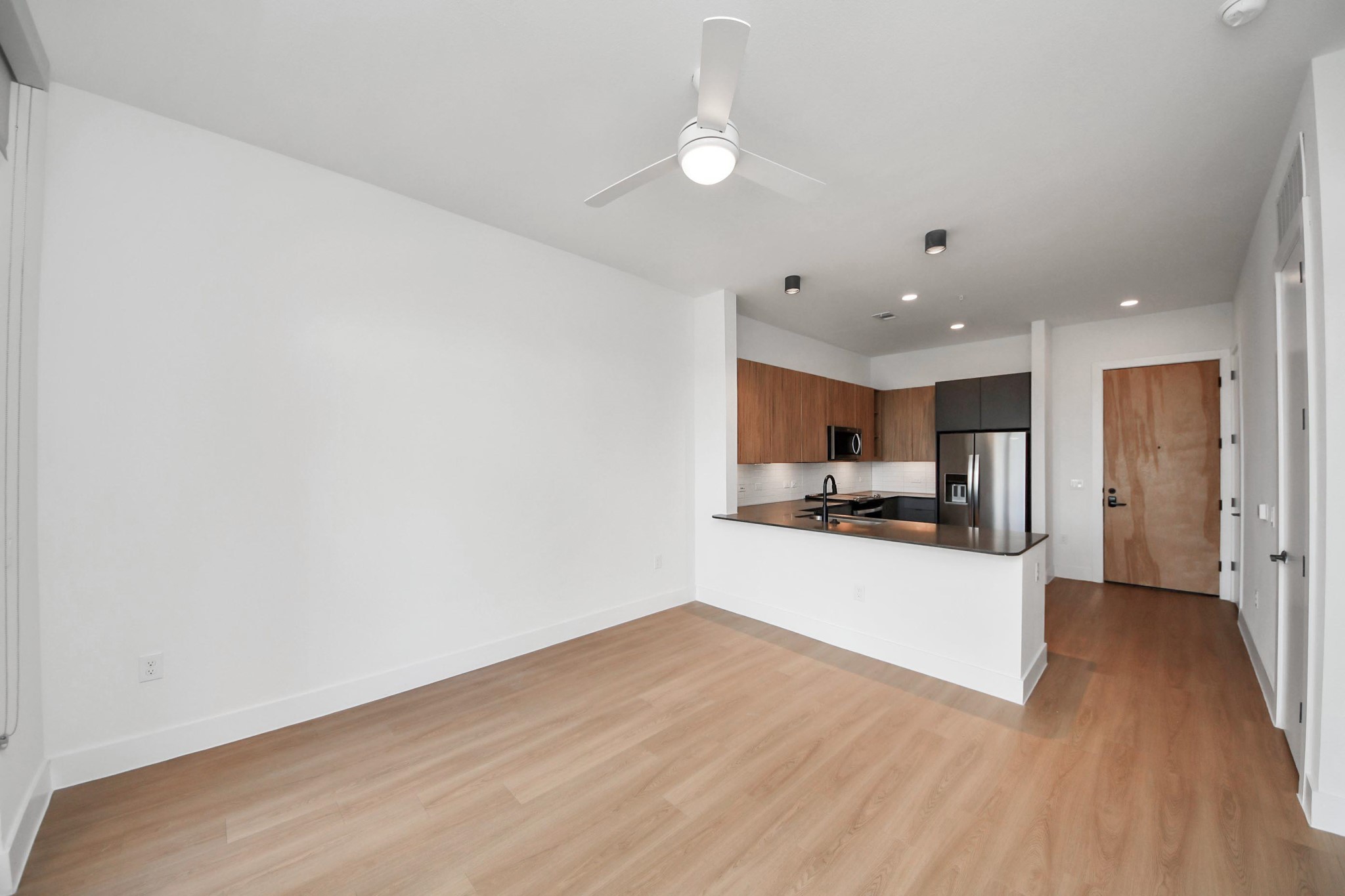 2810 Riverby Road, Unit 263 Houston, TX 77020 - Photo 10 of 38 a view of a kitchen with a sink and a stove top oven