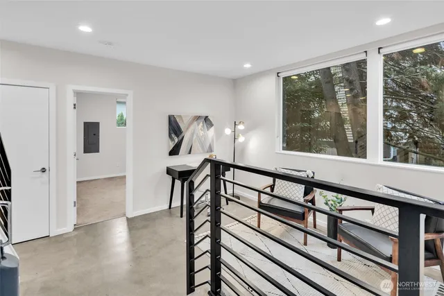 a view of an entryway with wooden floor