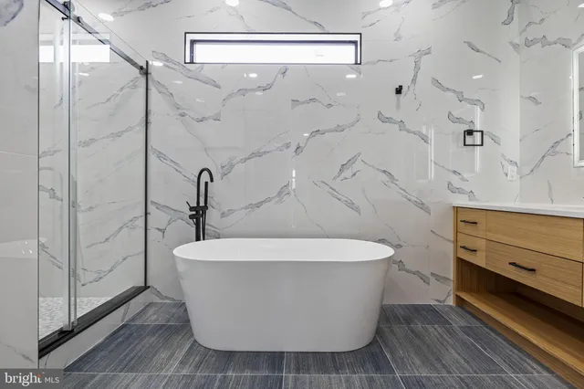 a view of a bathtub in a bathroom