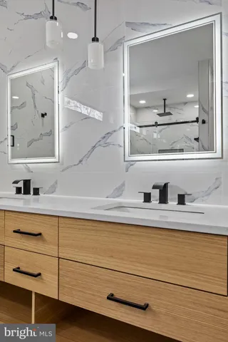 a view of room with wooden floor