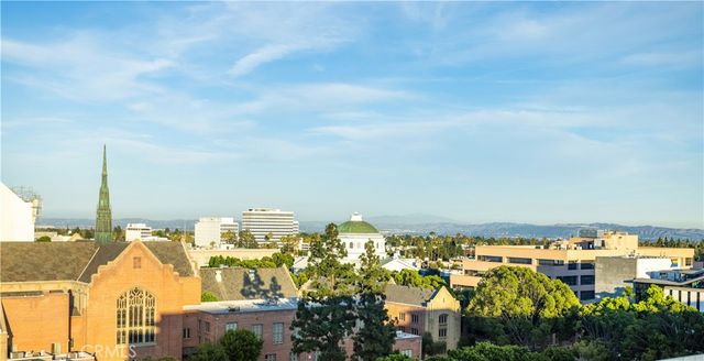 a view of a city with tall buildings