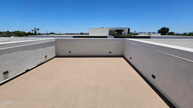 a terrace with a city view