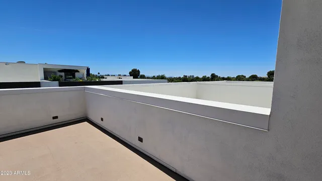 a view of a balcony with an outdoor space