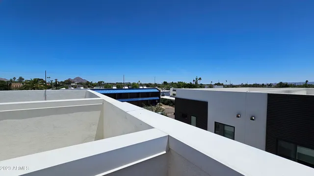 a terrace view with two chairs