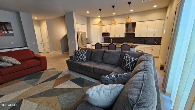 a living room with furniture and a couch