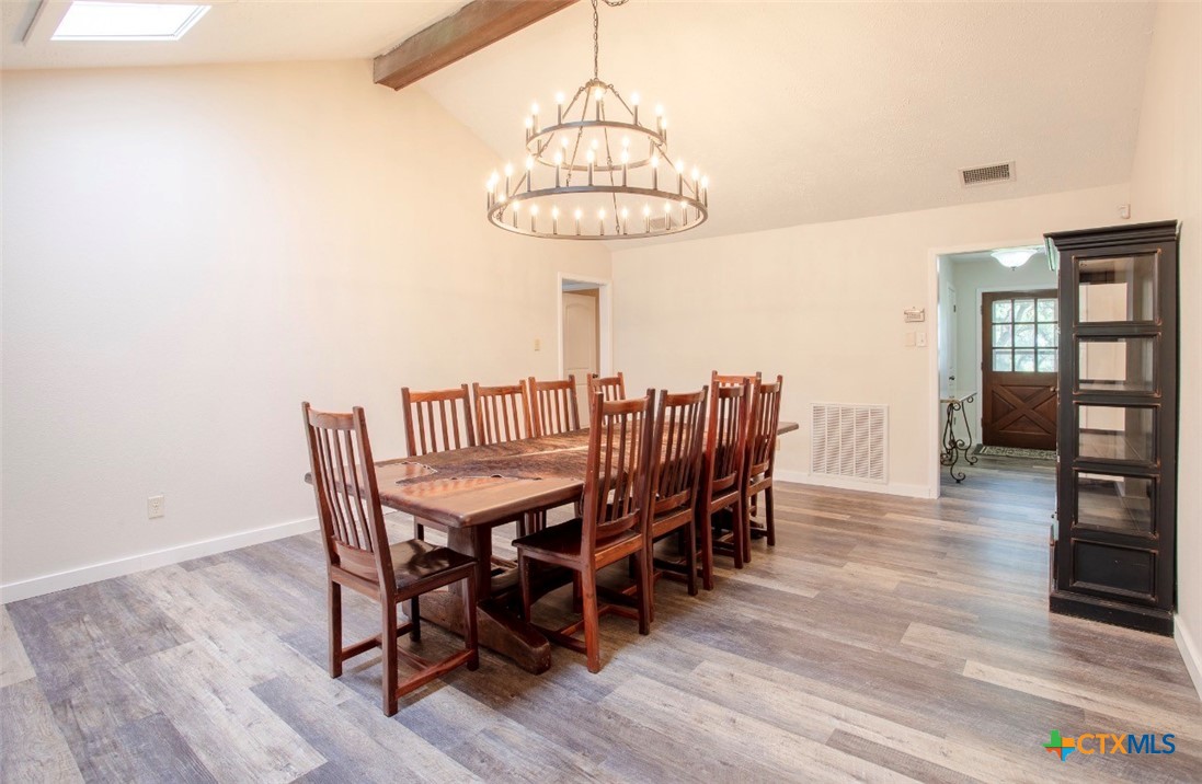 188 Cavalry Road Victoria, TX 77905 - Photo 13 of 30 a view of a dining room with furniture and wooden floor