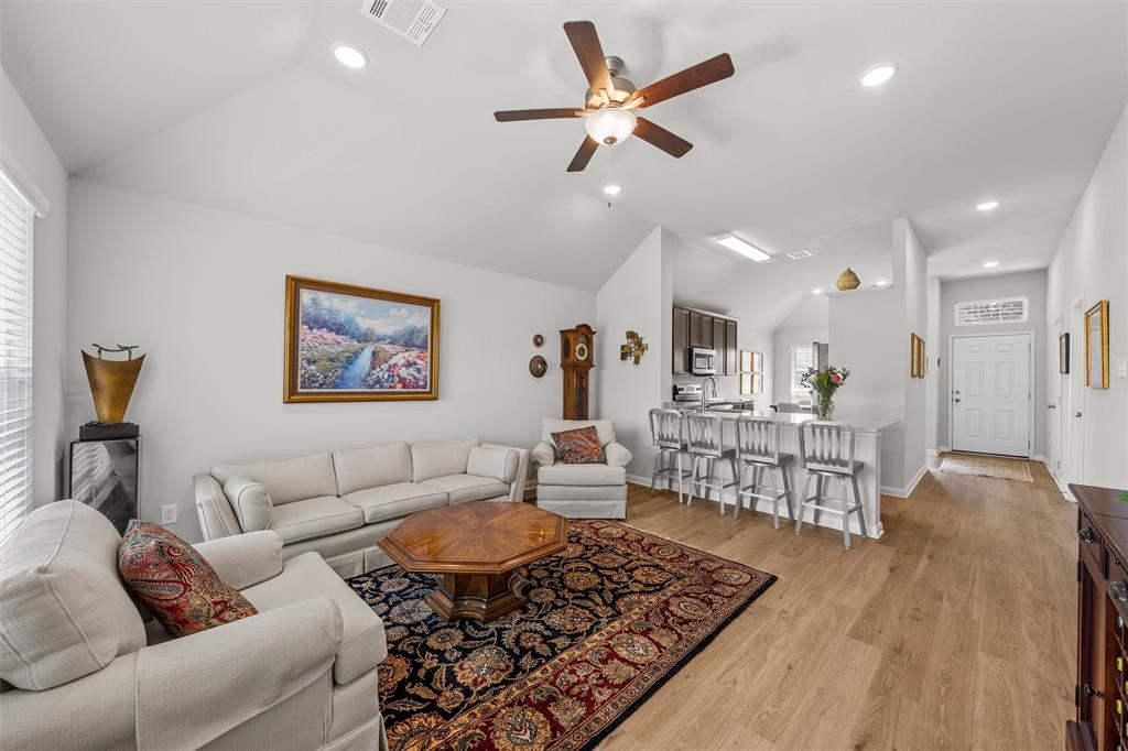 4056 Centerfire Road Waco, TX 76705 - Photo 12 of 27 a living room with furniture and a rug