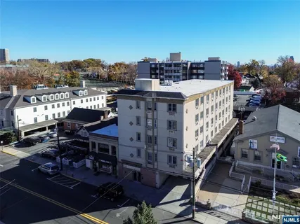 a view of a balcony with chairs