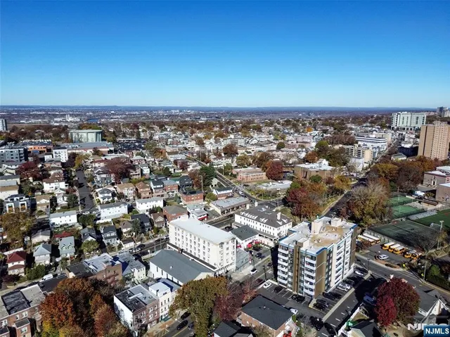 an aerial view of a house with a outdoor space