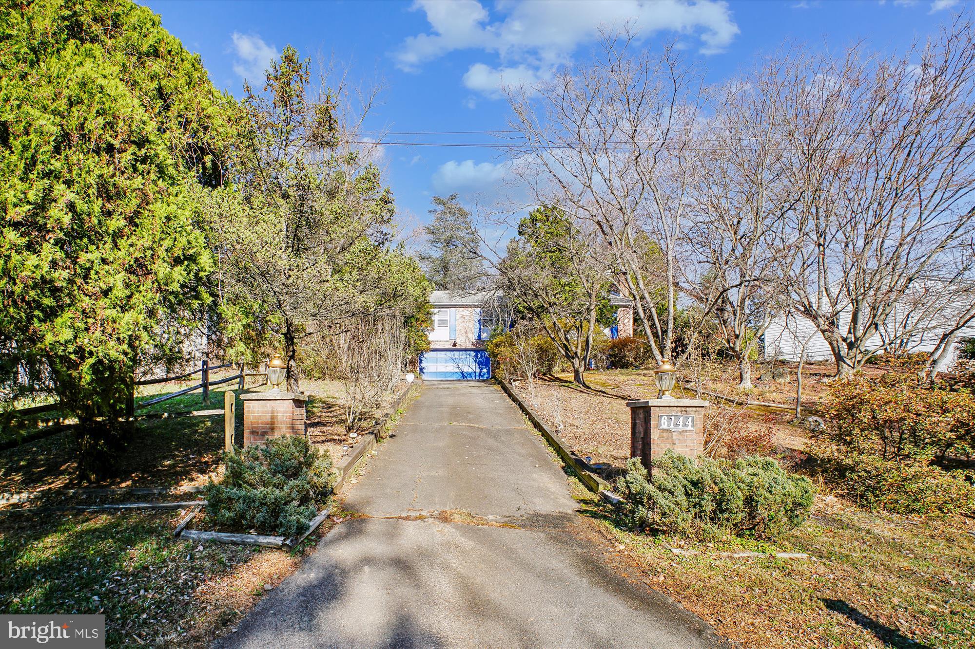 6144 Chesterbrook Road McLean, VA 22101 - Photo 11 of 50 a view of street along with trees