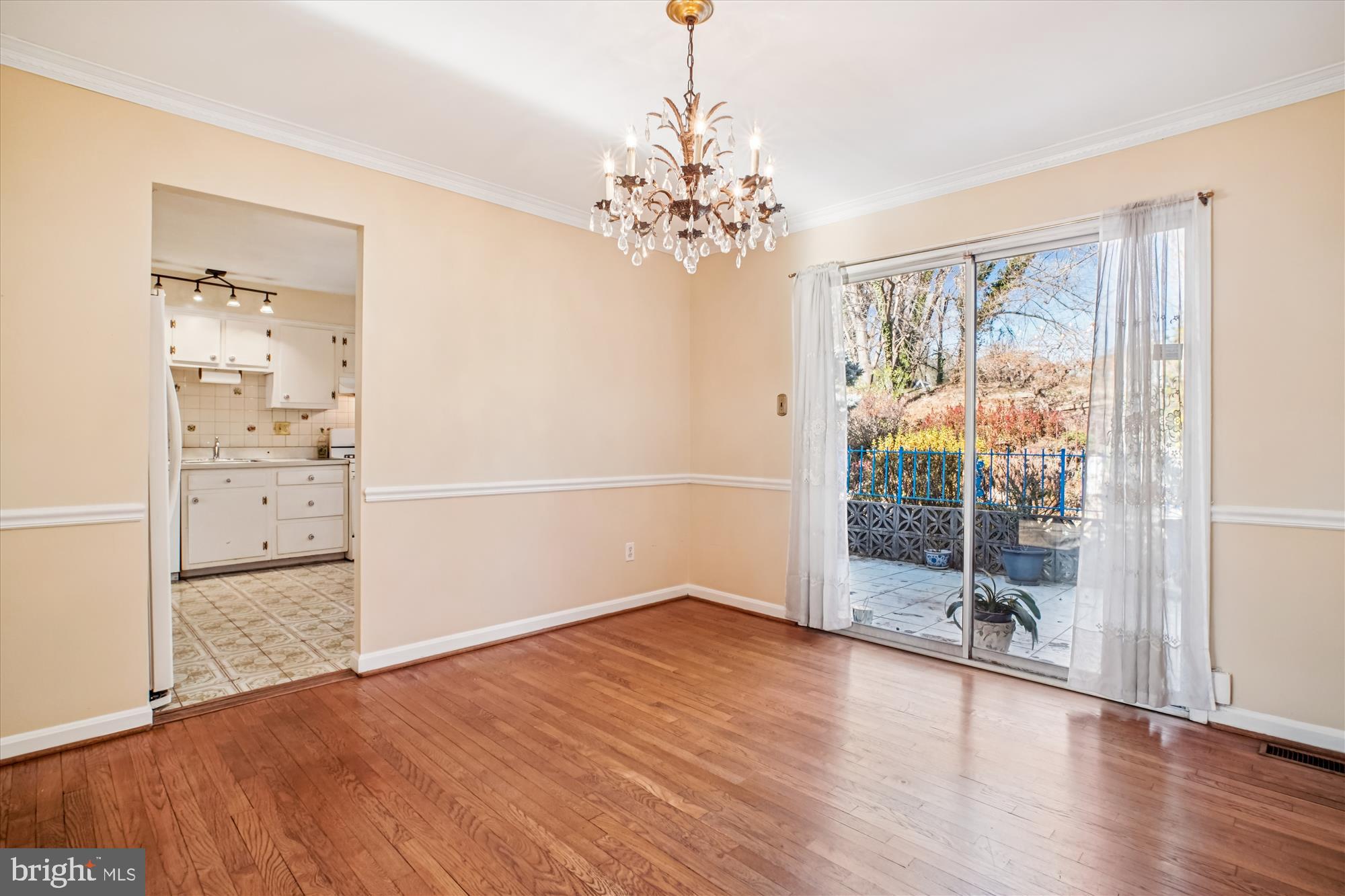 6144 Chesterbrook Road McLean, VA 22101 - Photo 24 of 50 wooden floor in an empty room with a window