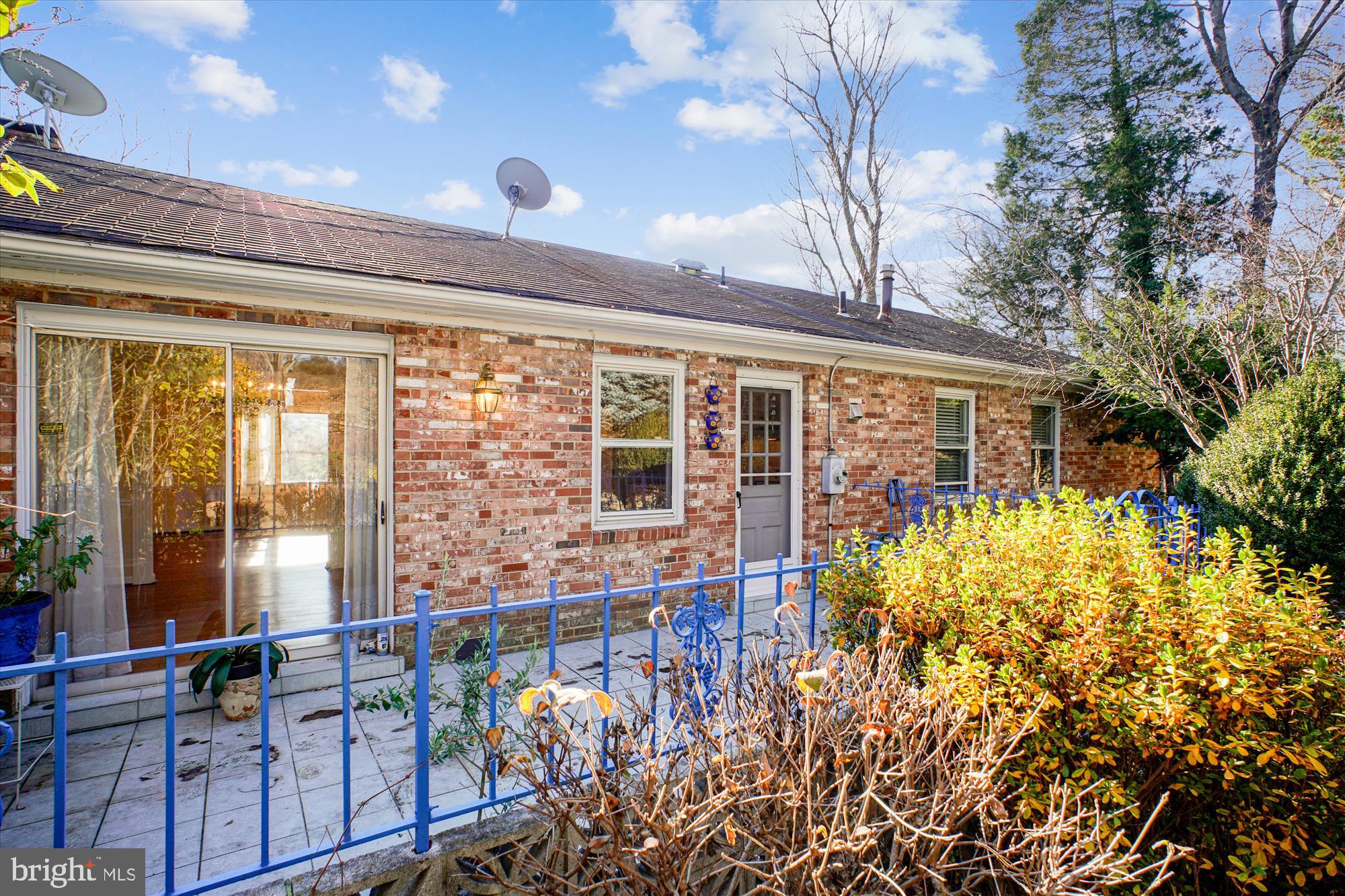 6144 Chesterbrook Road McLean, VA 22101 - Photo 32 of 50 a front view of a house with large windows