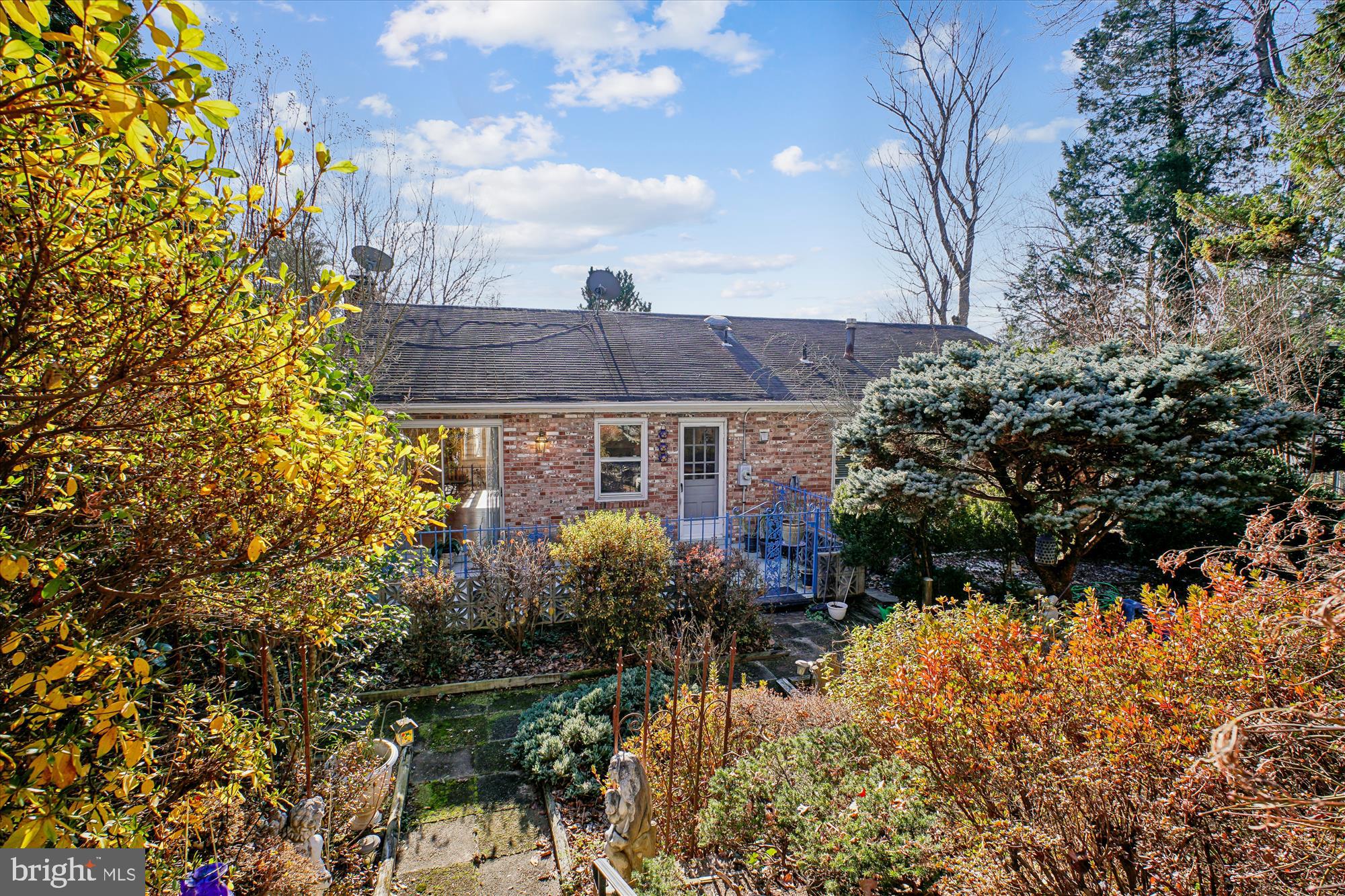 6144 Chesterbrook Road McLean, VA 22101 - Photo 39 of 50 a view of house with a yard and sitting area
