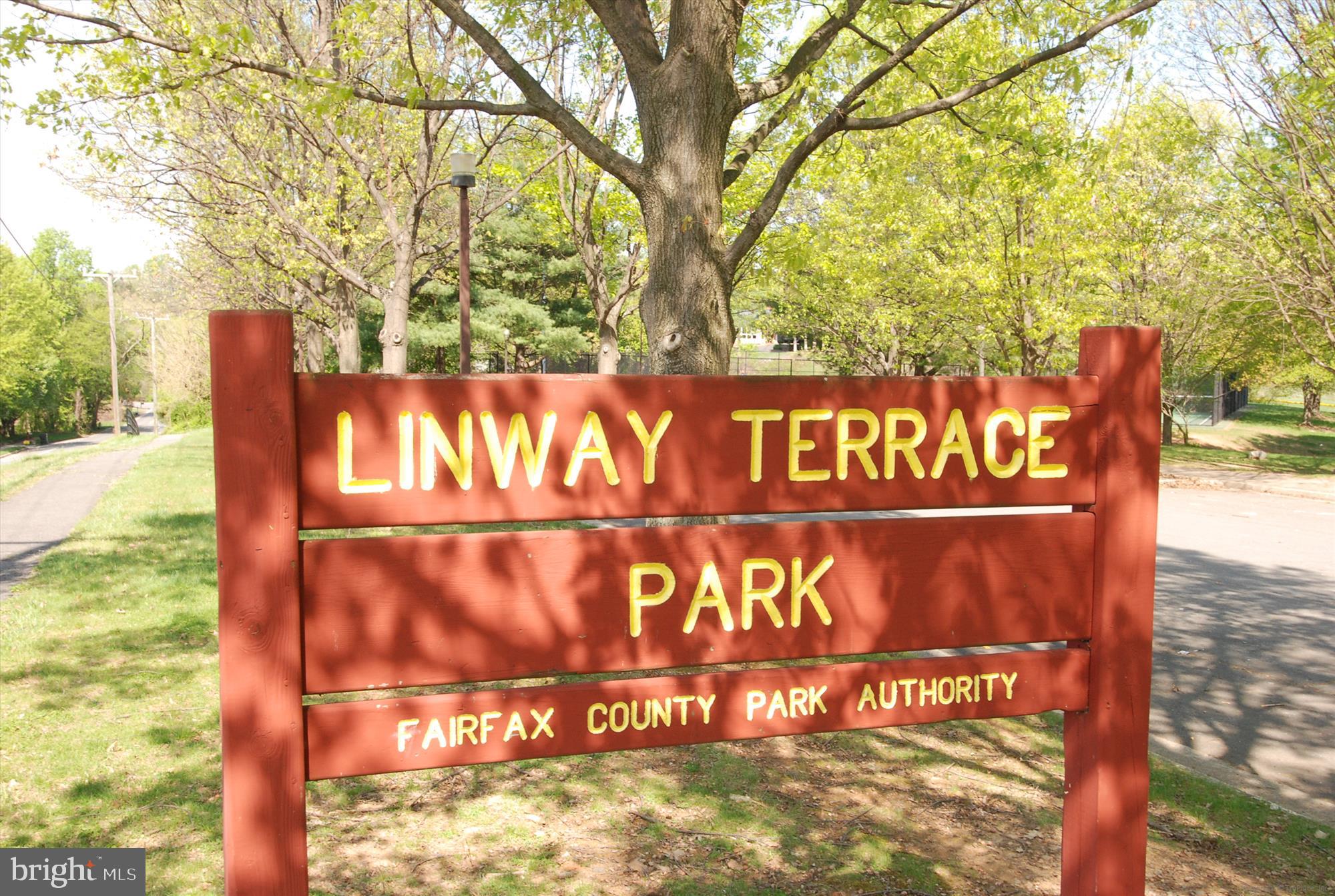 6144 Chesterbrook Road McLean, VA 22101 - Photo 43 of 50 a street sign on a wall next to a building