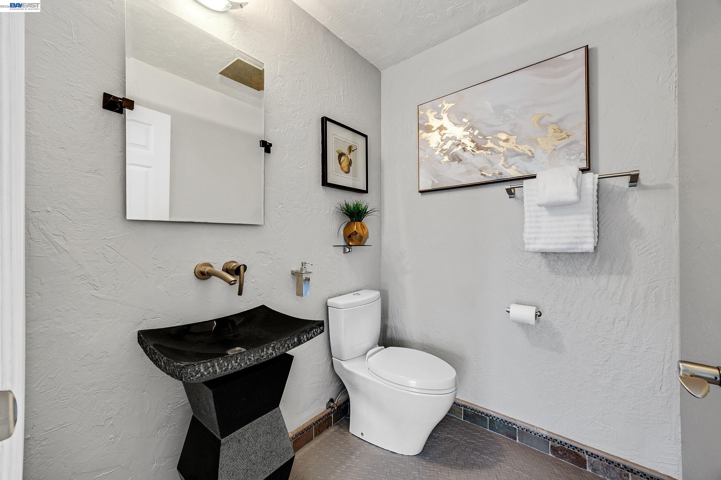 17 Suva Court San Ramon, CA 94582 - Photo 15 of 47 a bathroom with a toilet sink and mirror