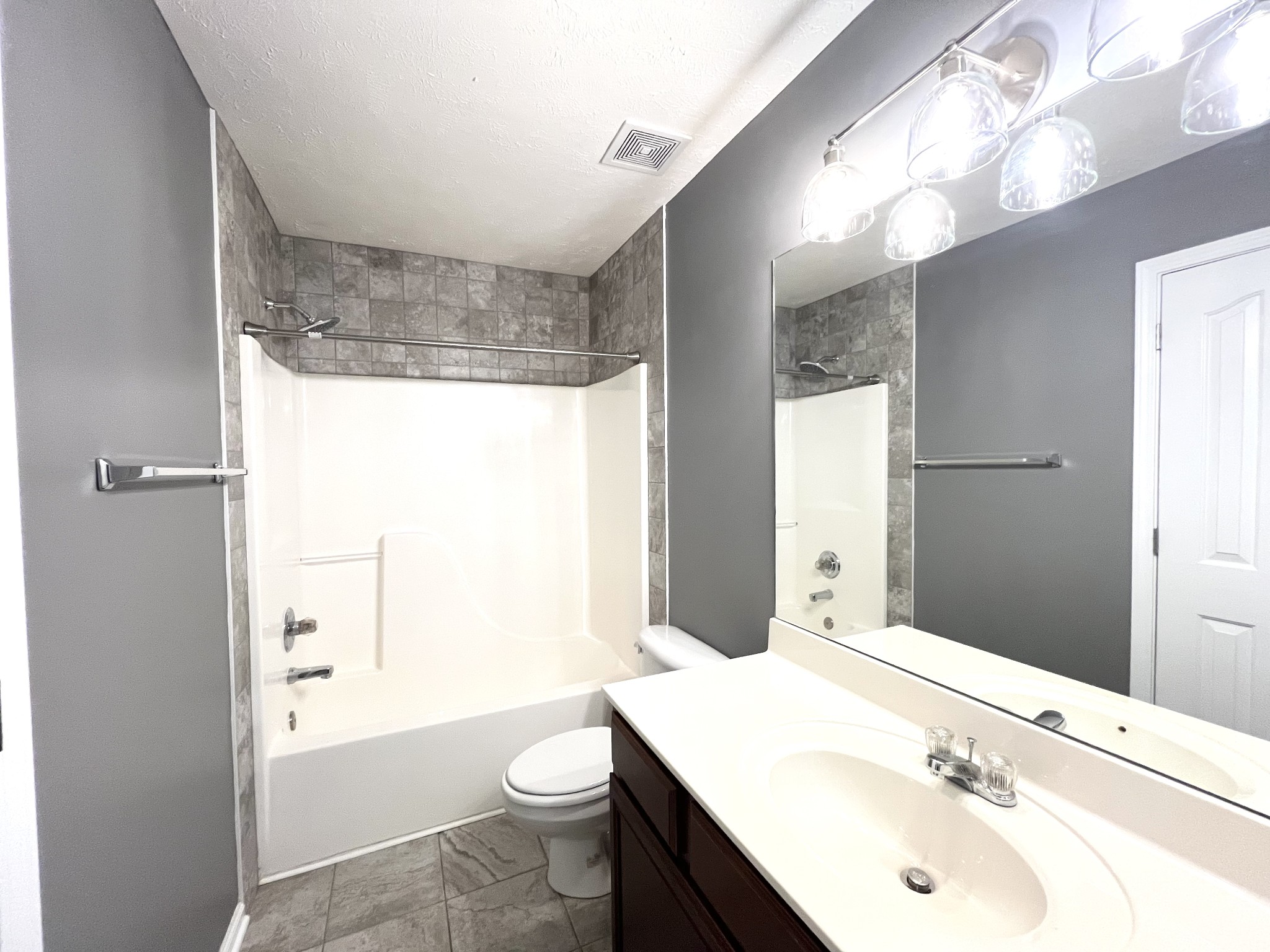 262 Arapaho Drive Murfreesboro, TN 37128 - Photo 14 of 24 a bathroom with a sink a toilet and shower