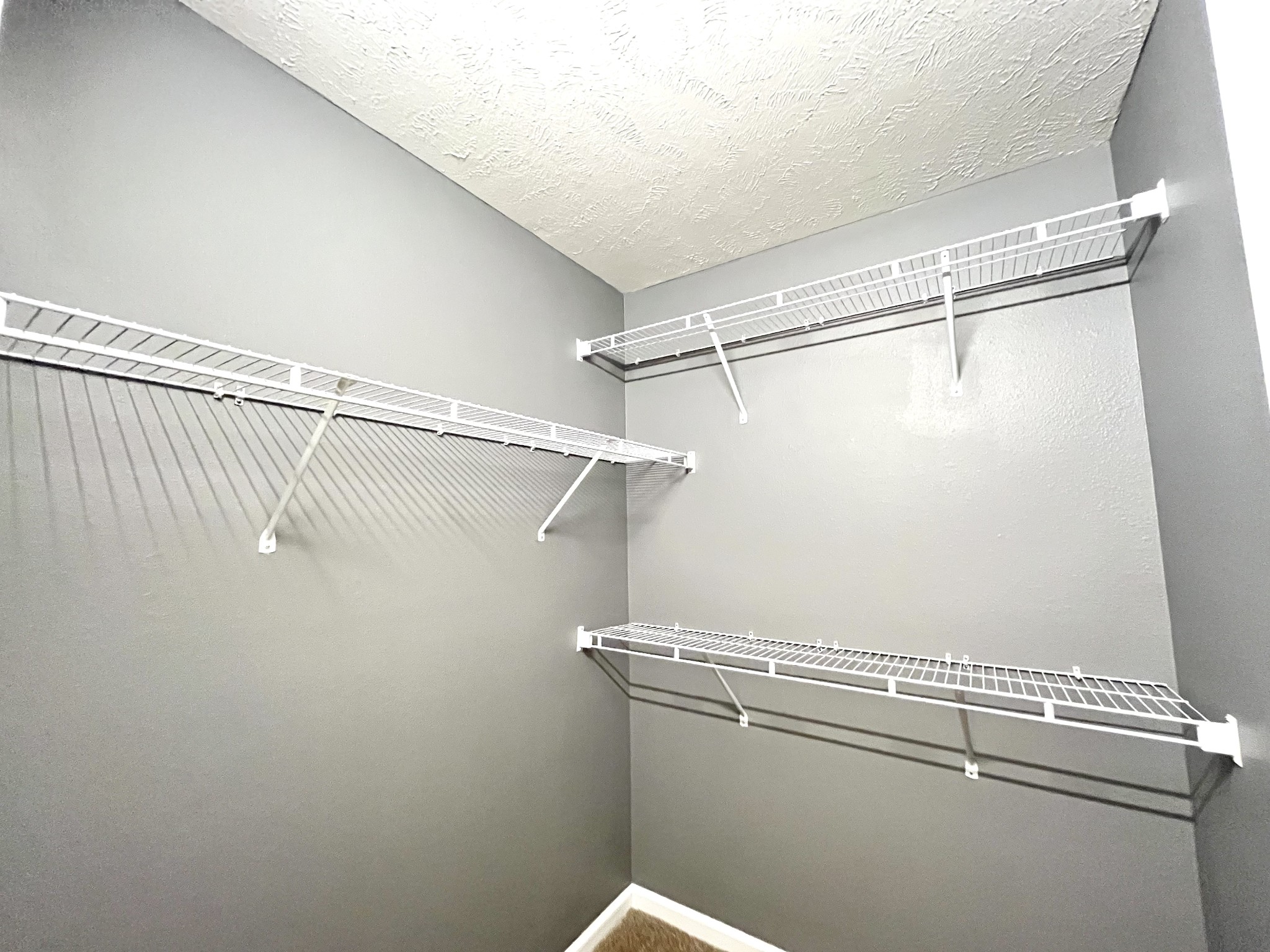 262 Arapaho Drive Murfreesboro, TN 37128 - Photo 16 of 24 a view of a room with racks on the wall