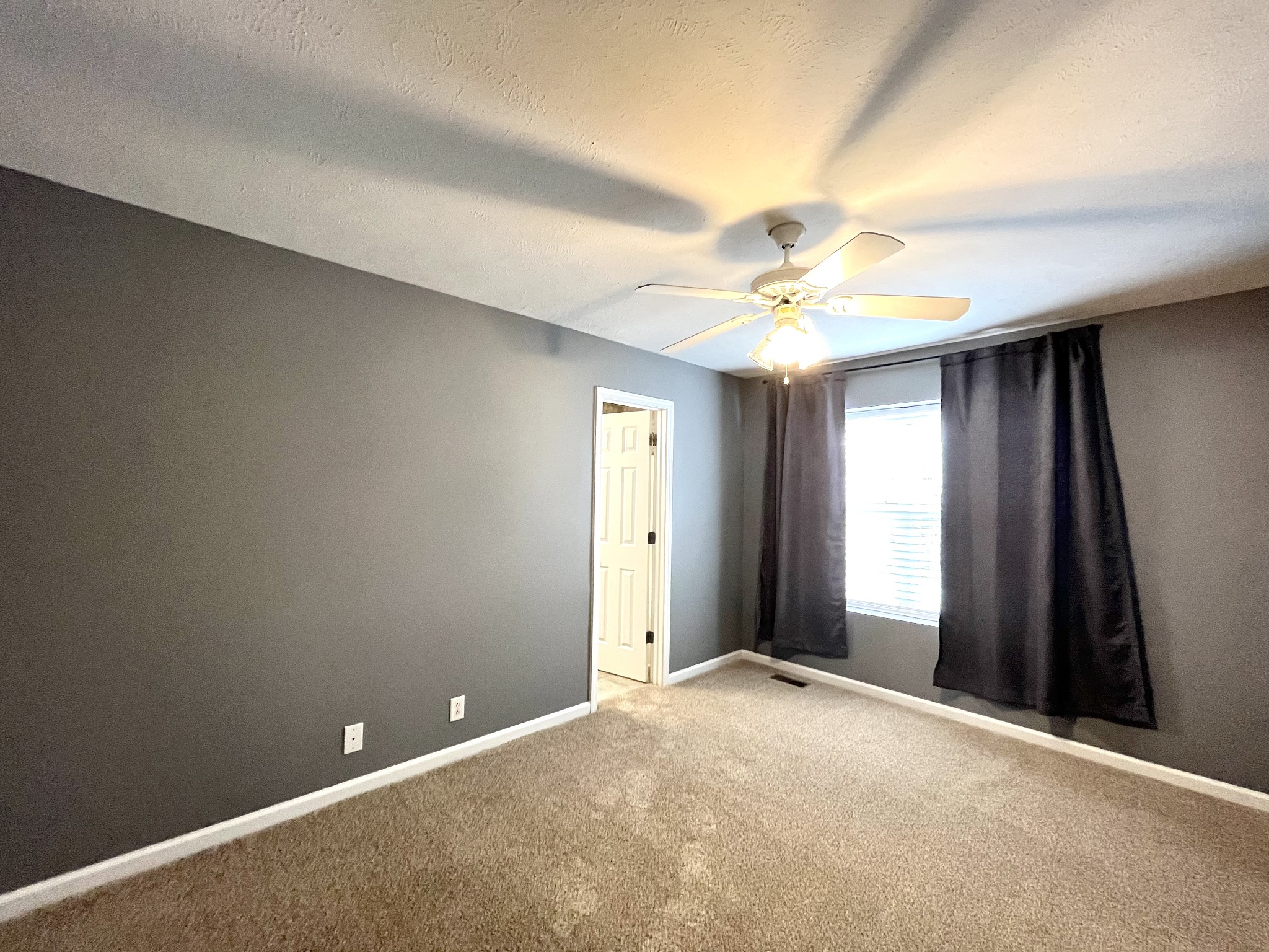 262 Arapaho Drive Murfreesboro, TN 37128 - Photo 17 of 24 wooden floor in an empty room with a window